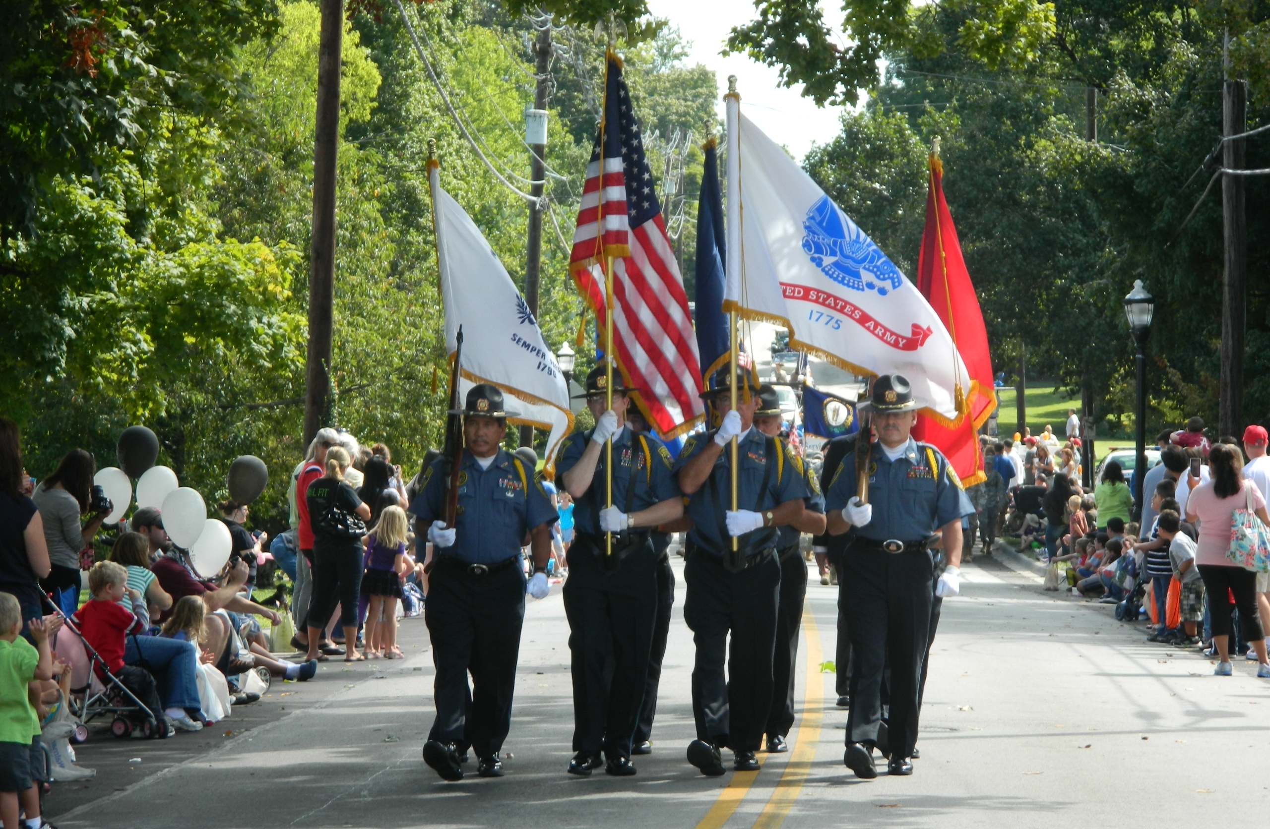 United States Army in parade with flags