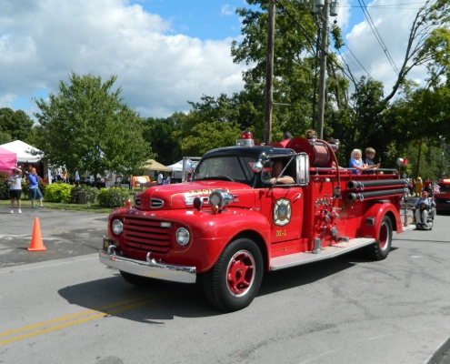 Historic firetruck vehicle in parade